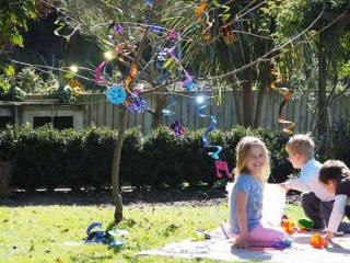 Children under decorated Tree